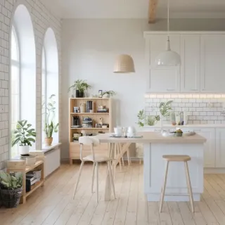 chauffage_fenetre.webp Une cuisine moderne et lumineuse avec des éléments en bois clair, un ilot central, et des plantes vertes pour une touche naturelle.